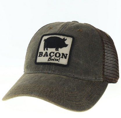 A brown trucker hat with a 'BACON Boise' logo patch on the front.